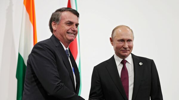 Líder russo Vladimir Putin se encontrou pela primeira vez com o presidente brasileiro Jair Bolsonaro em Osaka, palco do G20 - Sputnik Brasil