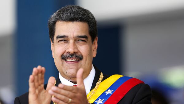Presidente da Venezuela, Nicolás Maduro, participa de desfile militar para comemorar o 208º aniversário da declaração da Independência da Venezuela em Caracas, em 5 de julho de 2019 - Sputnik Brasil