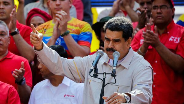 Presidente venezuelano Nicolás Maduro fala perante apoiadores em Caracas, Venezuela - Sputnik Brasil