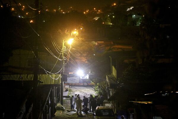 Polícia no lugar do assassinato de um jovem no bairro de Chamelecon da cidade de San Pedro Sula, Honduras - Sputnik Brasil
