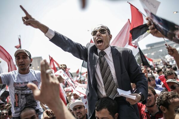 Ações de protesto contra ex-presidente egípcio Mohamed Mursi na praça Tahrir, Cairo - Sputnik Brasil