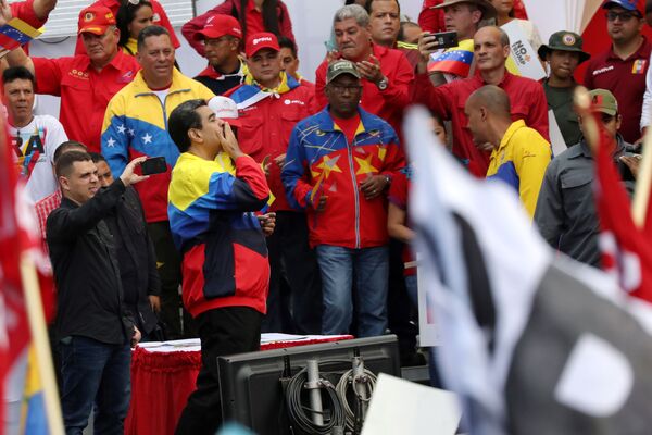 Presidente da Venezuela, Nicolás Maduro, participa da manifestação contra as sanções econômicas dos EUA - Sputnik Brasil