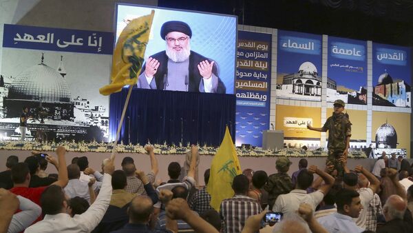 Líder do movimento libanês Hezbollah Sayyed Hassan Nasrallah durante transmissão em vídeo  - Sputnik Brasil