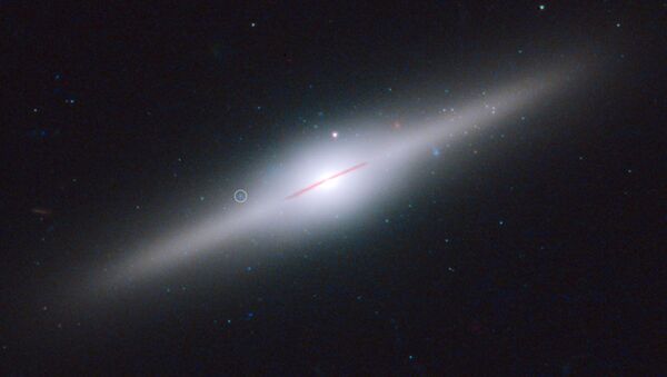 Galáxia ESO 243-49 e o buraco negro HLX-1 - Sputnik Brasil