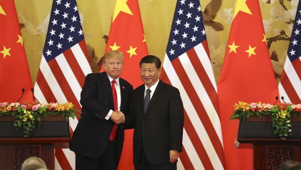 Donald Trump, presidente dos EUA, e Xi Jinping, presidente da China - Sputnik Brasil
