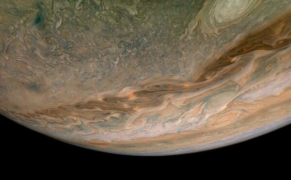 Nave espacial Juno da NASA captura nuvens em turbilhão na região do hemisfério norte de Júpiter - Sputnik Brasil