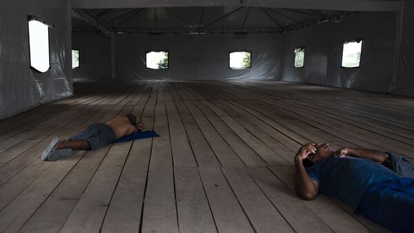Refugiados venezuelanos em centro de acolhida em Manaus. - Sputnik Brasil