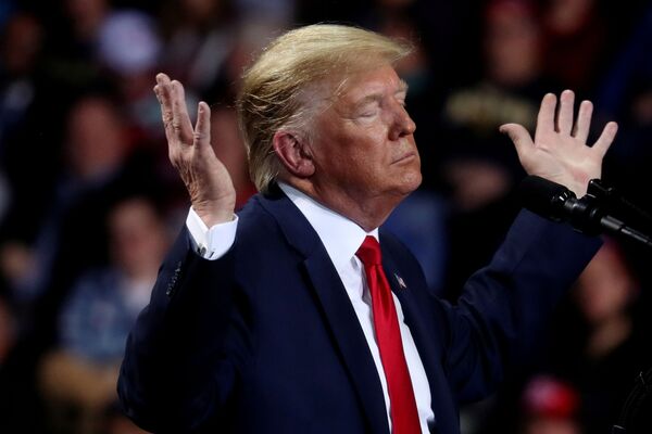 Presidente dos Estados Unidos, Donald Trump, durante a campanha eleitoral no estado de Michigan
 - Sputnik Brasil