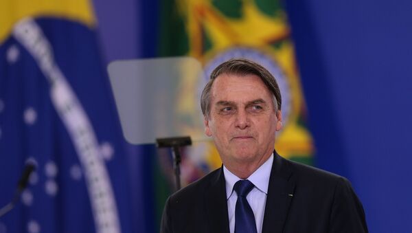 Presidente Jair Bolsonaro durante cerimônia no Palácio do Planalto - Sputnik Brasil