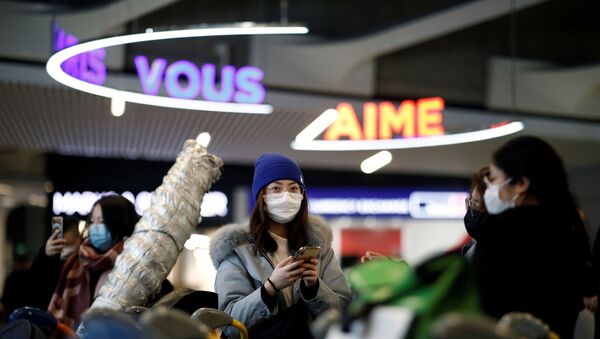 Passageiros de voo da Air China de Pequim usam máscaras - Sputnik Brasil