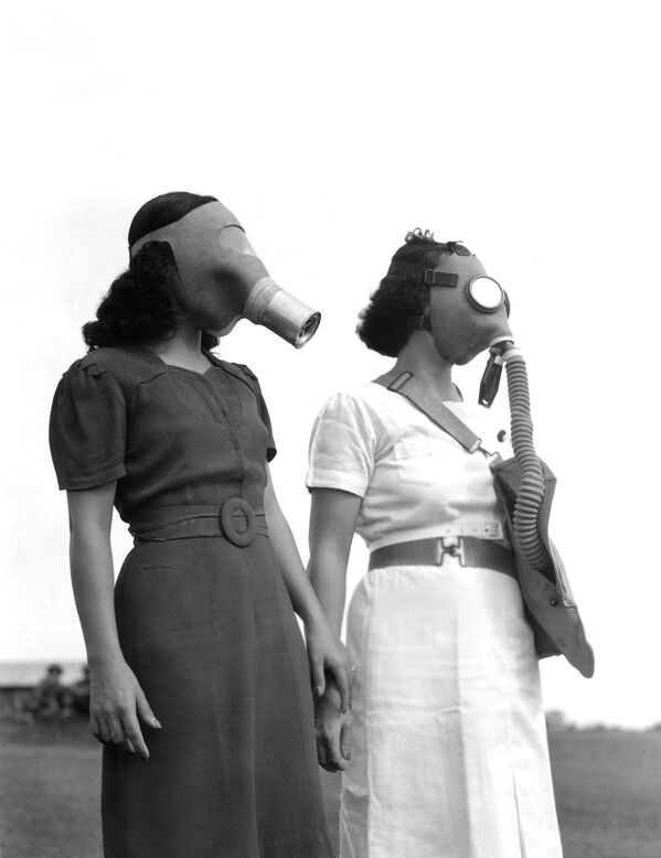 Mulheres utilizando máscaras nas Filipinas, em 1941 - Sputnik Brasil