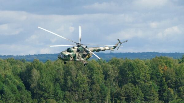 Militares em helicópteros Mi-8 durante o exercício militar internacional Rapid Trident 2019, em Yavoriv, região de Lvov, Ucrânia - Sputnik Brasil