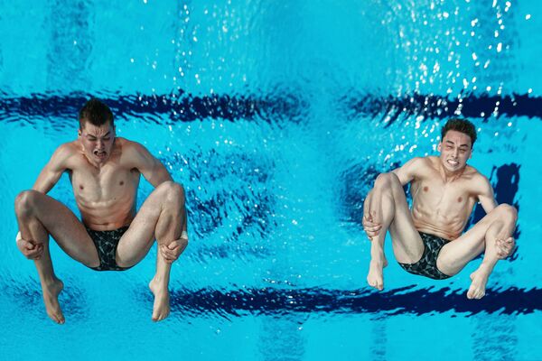 Dominique Bedgood e James Connor durante campeonato de esportes aquáticos em Kazan. - Sputnik Brasil