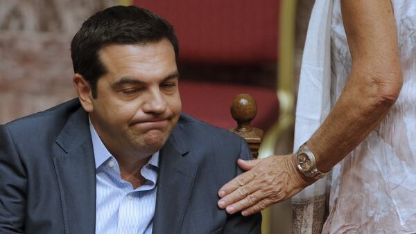 Greek Prime Minister Alexis Tsipras reacts as he attends a parliamentary session in Athens, Greece, August 14, 2015 - Sputnik Brasil