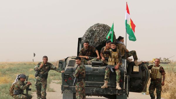 Iraqi Kurdish Peshmerga fighters - Sputnik Brasil