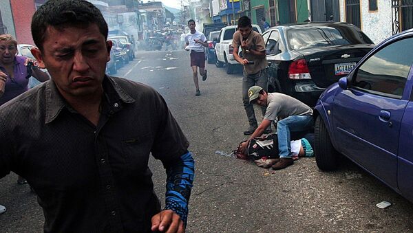 Adolescente morre durante protestos na Venezuela - Sputnik Brasil