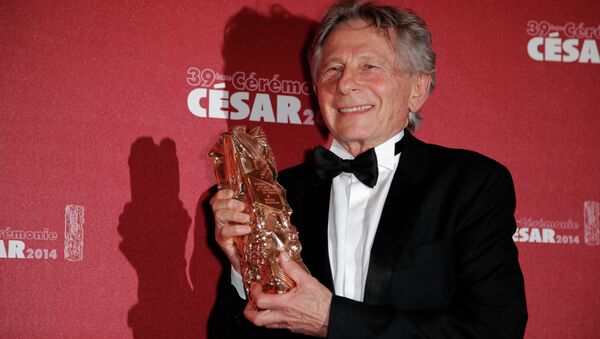 In this Feb. 28, 2014 file photo, Polish-French film director Roman Polanski holds his best director award during the 39th French Cesar Awards Ceremony in Paris. - Sputnik Brasil