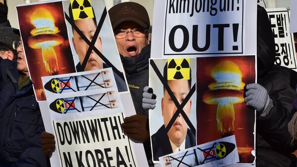 Cidadão sul-coreano participa do protesto contra testes nucleares da Coreia do Norte, 7 de janeio de 2016 - Sputnik Brasil
