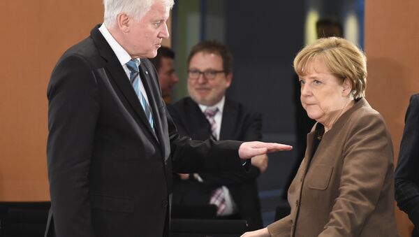 Seehofer and Merkel - Sputnik Brasil