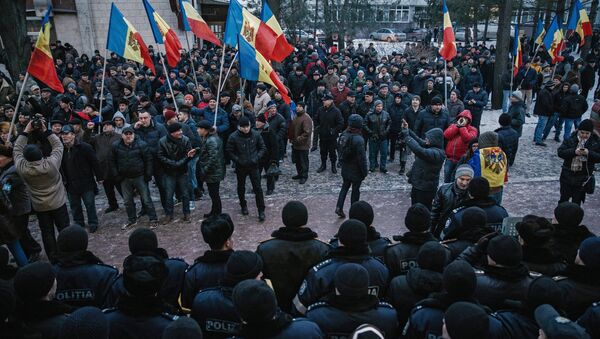Protesto perante o edifício do parlamento da Moldávia, Chisinau, 21 de janeiro de 2016 - Sputnik Brasil