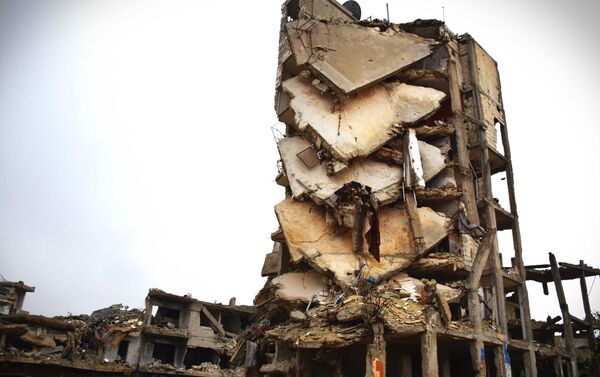 Edifício destruído na cidade de Homs, Síria, 26 de janeiro de 2016 - Sputnik Brasil