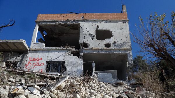 Ruinas de um prédio na cidade de Salma, libertada do Daesh - Sputnik Brasil