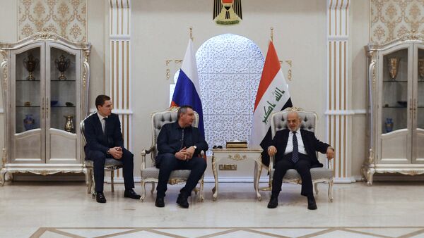 O vice-premier russo Dmitry Rogozin em visita ao Iraque, ao lado do chanceler iraquiano Ibrahim al-Jaafari - Sputnik Brasil