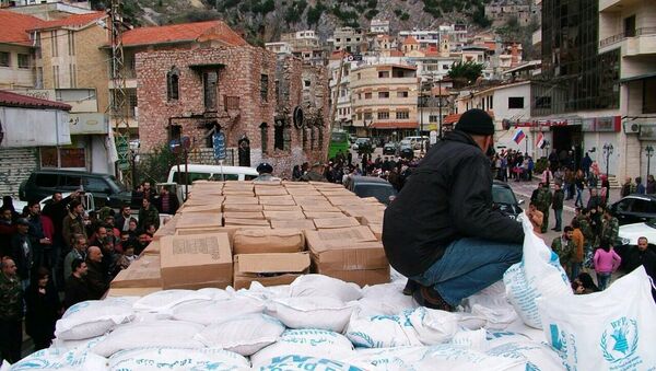 Ajuda humanitária russa é preparada para ser distribuída em Kessab, na província síria de Latakia - Sputnik Brasil
