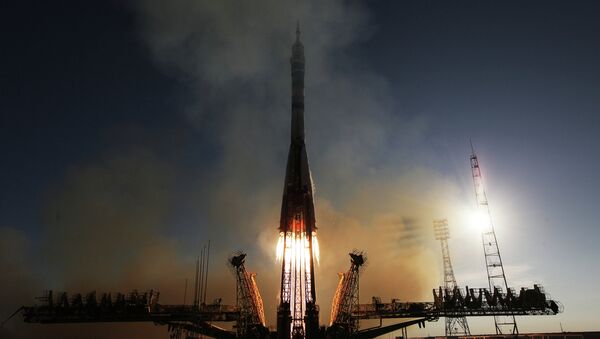 Lançamento de um foguete Soyuz FG com nave espacial tripulada Soyuz TMA-11M - Sputnik Brasil
