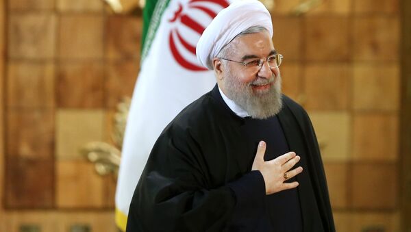Presidente iraniano no fim da conferência em Teerã. Espera-se a implementação do acordo histórico que dará um novo impulso à economia no Irã. - Sputnik Brasil