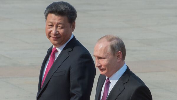 Presidente chinês Xi Jinping e o presidente russo Vladimir Putin durante a sua visita oficial à China, Pequim, China, 25 de junho de 2016 - Sputnik Brasil