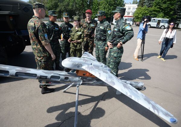 Exercícios táticos conjuntos das forças especiais da Guarda Nacional da Rússia e da Polícia Armada do Povo da China (PAP) “Cooperação-2016” - Sputnik Brasil