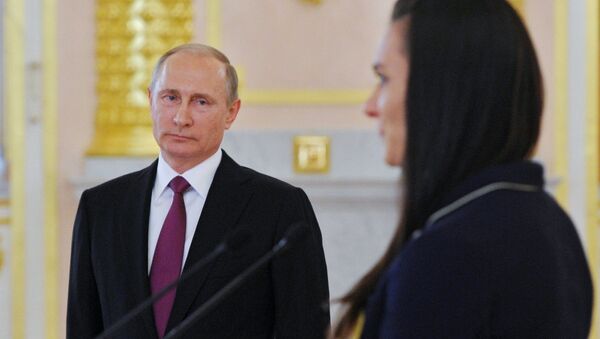 July 27, 2016. Russian President Vladimir Putin and two-time Olympic champion Yelena Isinbayeva during the former's meeting with the national Olympic team before its sendoff to the 2016 Summer Olympics in Rio de Janeiro. The Kremlin. - Sputnik Brasil