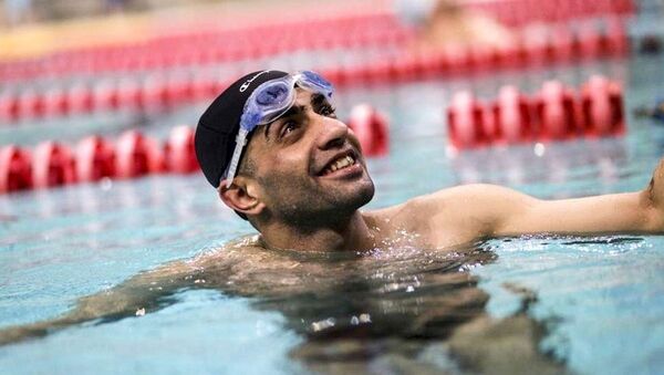 Nos Jogos Paralímpicos, o atleta refugiado sírio Ibrahim vai competir nos 50 e 100 metros nado livre na classe S10 - Sputnik Brasil