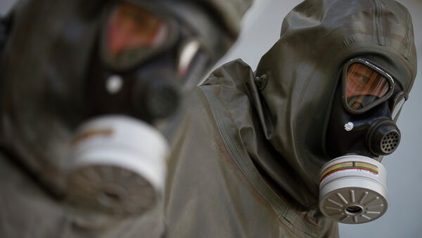 Funcionários da GEKA em instalação de eliminação de armas químicas em Munster, Alemanha - Sputnik Brasil