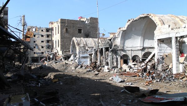 Prédios destruidos após ataque aéreo da coalizão internacional liderada pelos EUA na Síria (foto de arquivo) - Sputnik Brasil