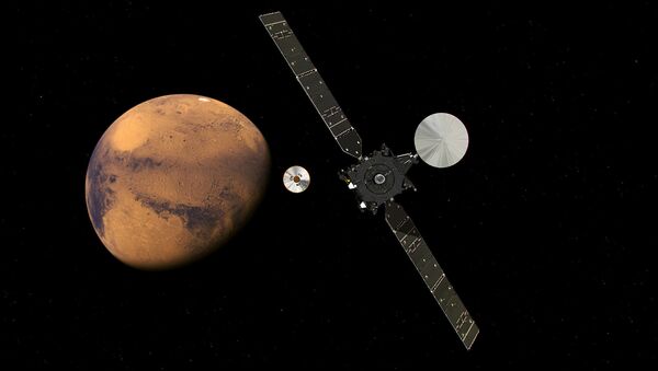Satélite científico TGO e seu módulo de entrada, descida e aterrissagem Schiaparelli, do programa ExoMars, se aproximando de Marte - Sputnik Brasil