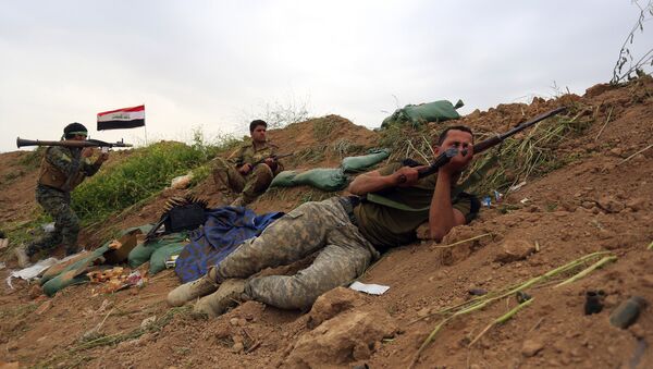 Forças de segurança do Iraque e forças de mobilização popular combatem o Daesh nos arredores de Kirkuk - Sputnik Brasil
