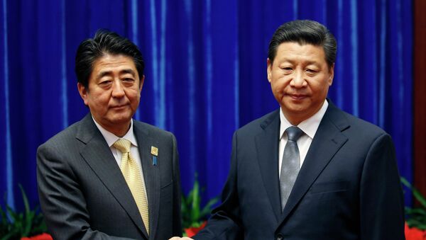 Shinzo Abe e Xi Jinping - Sputnik Brasil