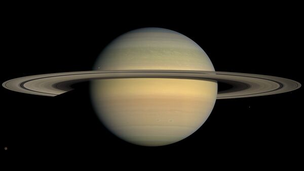 Vista por Saturno, imagem tirada pela sonda Cassini - Sputnik Brasil