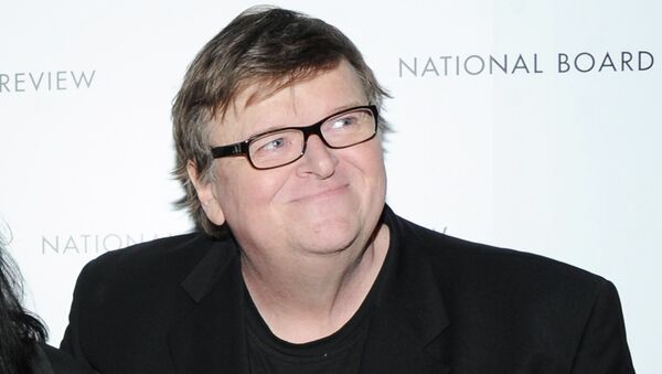 This Jan. 8, 2013 photo shows filmmaker Michael Moore at the National Board of Review Awards gala at Cipriani 42nd St. in New York. - Sputnik Brasil