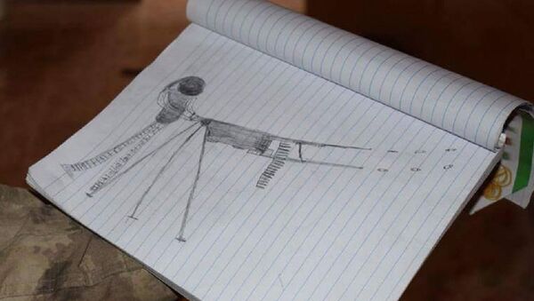 Terrorista atirando, desenhado por criança do califado do Daesh - Sputnik Brasil