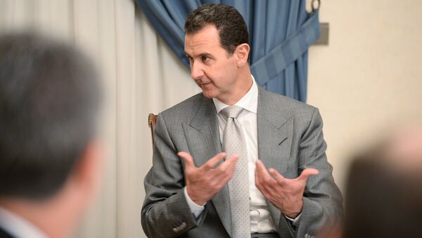 Bashar Assad durante um encontro com o vice-chefe do governo russo no início de 2017 em Damasco - Sputnik Brasil