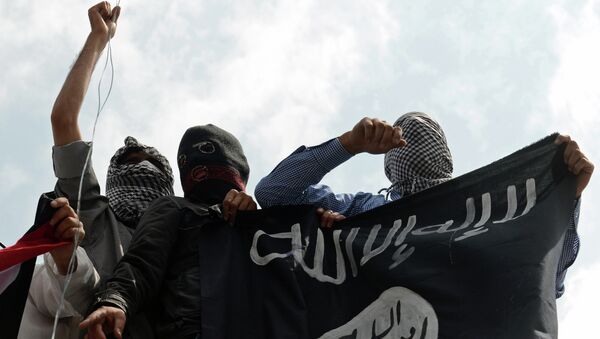 Militantes do grupo terrorista Daesh - Sputnik Brasil