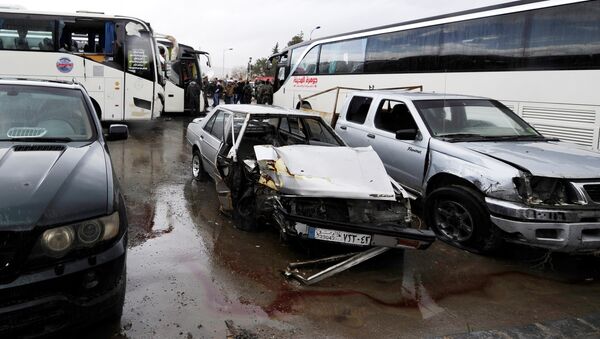 Veículos destruídos pelas explosões que deixaram mais de 40 mortos no último sábado, 11 de março de 2017, em Damasco - Sputnik Brasil