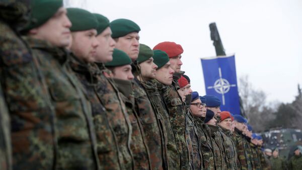 German soldiers attend a ceremony to welcome the German battalion being deployed to Lithuania as part of NATO deterrence measures against Russia in Rukla, Lithuania February 7, 2017 - Sputnik Brasil