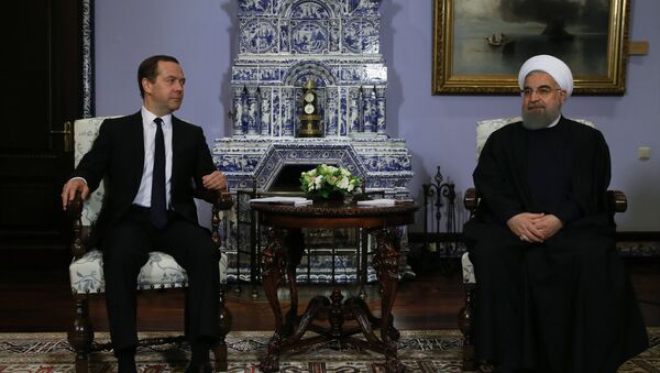 March 27, 2017. Russian Prime Minister Dmitry Medvedev meets with President of Iran Hassan Rouhani, right, on his official visit to Russia - Sputnik Brasil