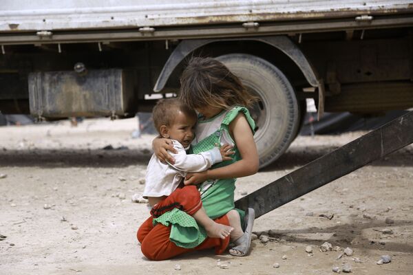 Crianças iraquianas em campo de refugiados na Síria - Sputnik Brasil