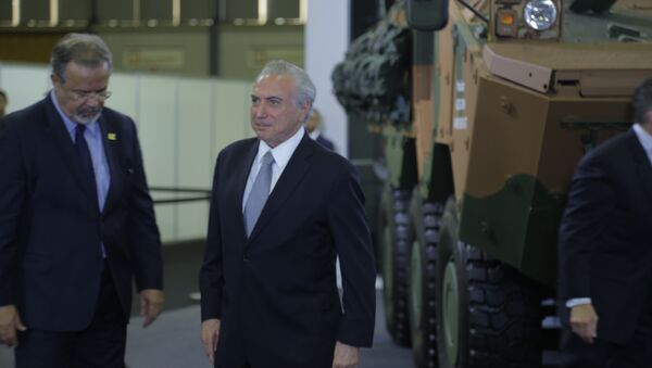 O presidente do Brasil, Michel Temer, e o ministro da Defesa, Raul Jungmann, na LAAD, maior feira de armamentos da América Latina, no Rio de Janeiro - Sputnik Brasil
