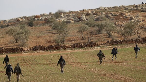 Free Syrian Army fighters are seen in al Baza'a village in the outskirts of al-Bab town, Syria - Sputnik Brasil